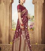 Maroon woven Banarasi silk blend saree with blouse