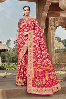 Rani pink woven Banarasi silk blend saree with blouse