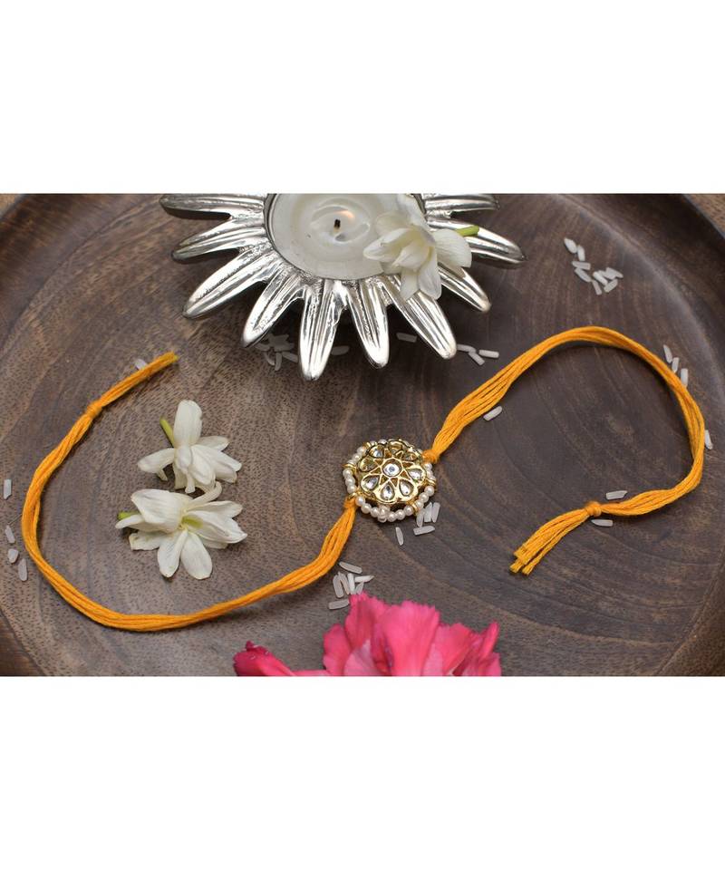 Gold Tone Kundan pearl Rakhi