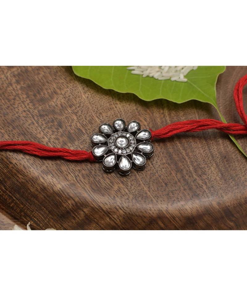 Silver floral Kundan rakhi
