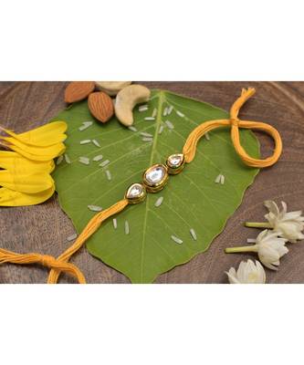 Gold Tone Kundan Rakhi with yellow cotton thread 2
