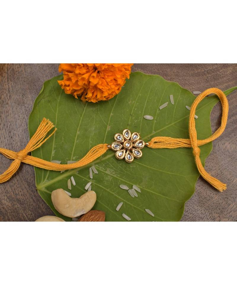 Yellow Gold Tone Floral Kundan Rakhi