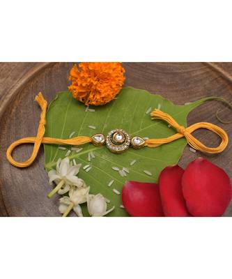 High quality Kundan studded rakhi with yellow cotton thread 1