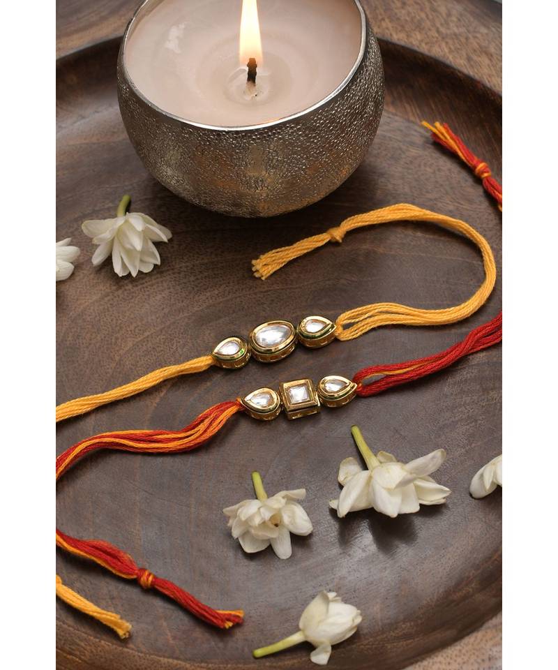 Gold tone kundan rakhi  Set of 2