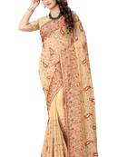 Beige embroidered georgette saree with blouse