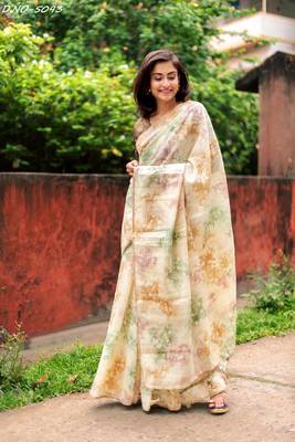 Cream woven organza saree with blouse 1