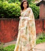 Cream woven organza saree with blouse