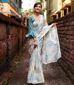 Off white woven organza saree with blouse
