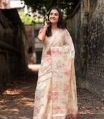 Cream woven organza saree with blouse