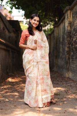 Cream woven organza saree with blouse 2