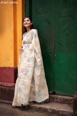 Cream woven organza saree with blouse 1