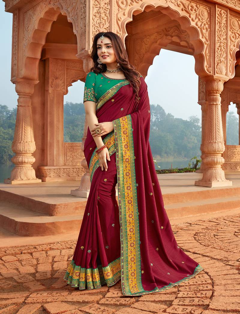 Maroon embroidered georgette saree with blouse