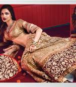 Deepika Padukone in golden designer lehenga