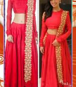 Yami Gautam in Red Net designer Lehenga with Raw Silk Blouse