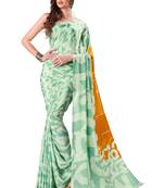 Green printed crepe saree with blouse