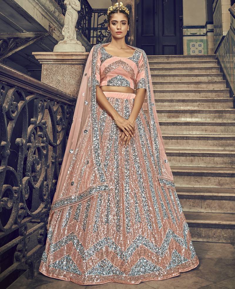 PEACH SEQUINS EMBROIDERED NET SEMI STITCHED BRIDAL LEHENGA