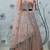 PEACH SEQUINS EMBROIDERED NET SEMI STITCHED BRIDAL LEHENGA