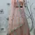 PEACH SEQUINS EMBROIDERED NET SEMI STITCHED BRIDAL LEHENGA