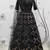 BLACK SEQUINS EMBROIDERED NET SEMI STITCHED BRIDAL LEHENGA