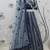 GREY SEQUINS EMBROIDERED NET SEMI STITCHED BRIDAL LEHENGA