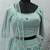TURQUOISE-BLUE SEQUINS EMBROIDERED NET SEMI STITCHED BRIDAL LEHENGA