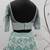 TURQUOISE-BLUE SEQUINS EMBROIDERED NET SEMI STITCHED BRIDAL LEHENGA