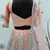 PEACH SEQUINS EMBROIDERED NET SEMI STITCHED BRIDAL LEHENGA