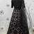 BLACK SEQUINS EMBROIDERED NET SEMI STITCHED BRIDAL LEHENGA