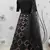 BLACK SEQUINS EMBROIDERED NET SEMI STITCHED BRIDAL LEHENGA