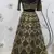 OLIVE-GREEN SEQUINS EMBROIDERED NET SEMI STITCHED BRIDAL LEHENGA