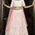 PEARL-WHITE SEQUINS EMBROIDERED GEORGETTE SEMI STITCHED BRIDAL LEHENGA