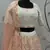 PEARL-WHITE SEQUINS EMBROIDERED GEORGETTE SEMI STITCHED BRIDAL LEHENGA