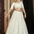 PEARL-WHITE SEQUINS EMBROIDERED GEORGETTE SEMI STITCHED BRIDAL LEHENGA