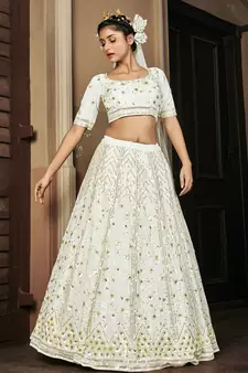 PEARL-WHITE SEQUINS EMBROIDERED GEORGETTE SEMI STITCHED BRIDAL LEHENGA