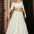 PEARL-WHITE SEQUINS EMBROIDERED GEORGETTE SEMI STITCHED BRIDAL LEHENGA