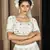 PEARL-WHITE SEQUINS EMBROIDERED GEORGETTE SEMI STITCHED BRIDAL LEHENGA