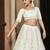 PEARL-WHITE SEQUINS EMBROIDERED GEORGETTE SEMI STITCHED BRIDAL LEHENGA