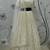 PEARL-WHITE SEQUINS EMBROIDERED GEORGETTE SEMI STITCHED BRIDAL LEHENGA