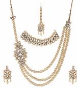 Steorra jewels White Pearl Side Kundan Pendant Necklace Set with Earings and Maang Tikka for Women with Chokar