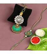 Auspicious Golden Flower with Green Dome Shaped Lumba Bhaiya Bhabhi Rakhi Set