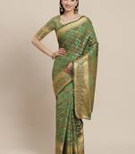 Green woven banarasi silk saree with blouse