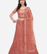 Peach embroidered net semi stitched lehenga