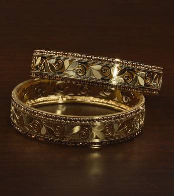 Gold Plated Intricate Self Worked Zircon Embellished Pair of Glossy Bangles BD508 1