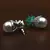 Rhodium Plated Emerald and Pearl Embellished AD Earrings 216ED604