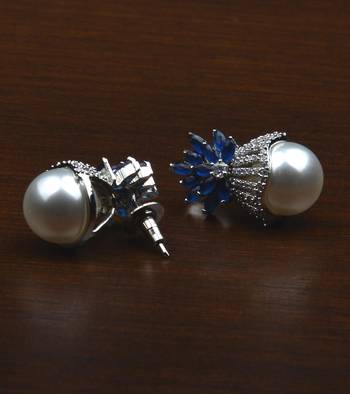 Rhodium plated sapphire and pearl embellished ad earrings 216ed605 2