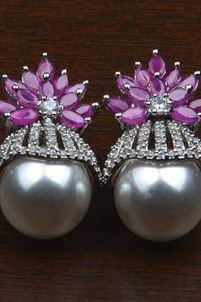 Rhodium Plated Ruby and Pearl Embellished AD Earrings 216ED606