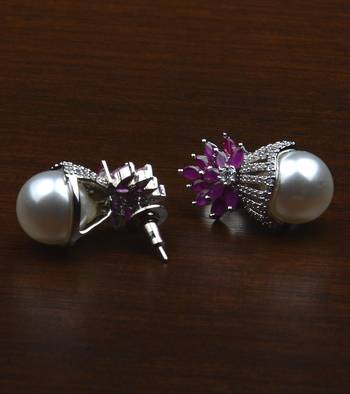 Rhodium plated ruby and pearl embellished ad earrings 216ed606 2