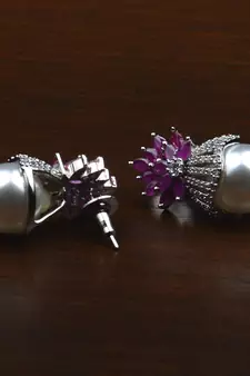 Rhodium Plated Ruby and Pearl Embellished AD Earrings 216ED606
