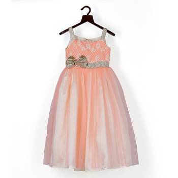 Lacy peach gown with golden bow 1