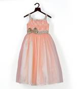 Lacy peach gown with golden bow